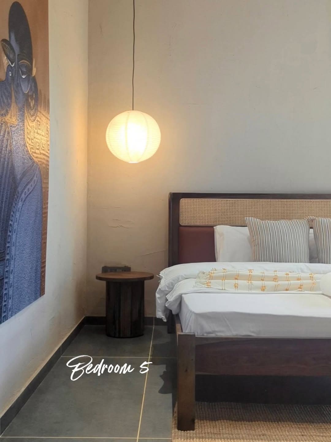 Bedroom with rattan headboard